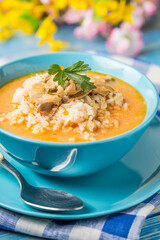 Tomato soup with rice.