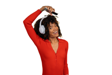 Happy young woman dancing listening music with headphones and smartphone