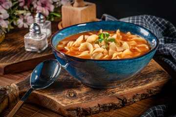 Tomato soup with noodles.
