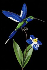 Naklejka premium Jeweled hummingbird perched on flower, metal craft, black background