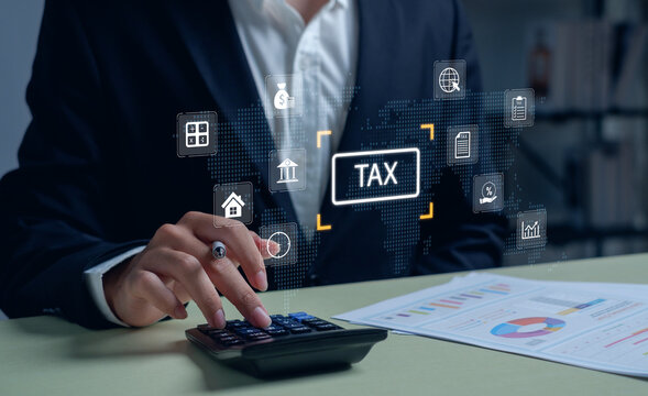 Tax and financial analysis concept showing professional using calculator with digital tax icons, representing online taxation, accounting, financial management, data analysis, modern fiscal technology - Powered by Adobe