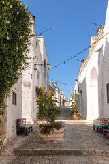Pictures of Trulli, Italy, showing charming conical-roof houses, cobblestone streets, and historic architecture. Perfect for travel, tourism, lifestyle, and cultural photography.