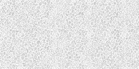 Abstract speckled pattern with irregular organic shapes in grayscale tones
