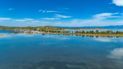 Aerial drone view of Fteroti Beach, sandbanks and lagoon in Sithonia, Chalkidiki, Greece