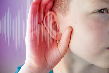 Closeup caucasian small childs ear, sound wave, Hearing Test, ringing or buzzing sensation, Auditory impairment, tinnitus, Inflammation middle ear, acoustic trauma