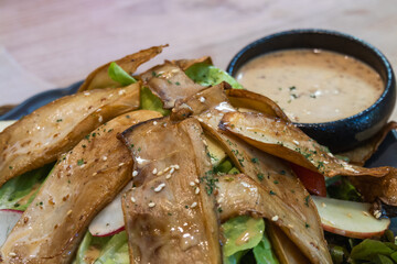 Delicious healthy salad with apple slices restaurant food indoor close-up nutrition