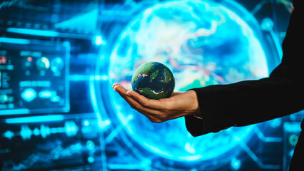 Business professional holding small Earth model before futuristic digital interface, global responsibility,environmental awareness,world protection, sustainability, modern international collaboration