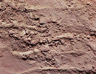 Close up cinnamon powder surface showing natural spice texture and organic seasoning detail