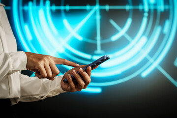 ฺBusiness professional using smartphone against futuristic digital radar interface, technology interaction, data scanning, cyber communication, innovation, modern mobility, high-tech environment.
