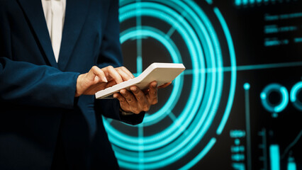 Business professional using digital tablet before futuristic radar-style interface, technology interaction, data processing, cyber analytics, innovation, modern workflow, advanced digital operations