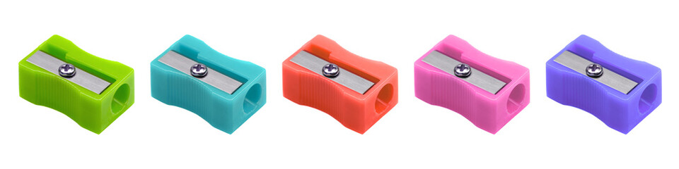 Colorful plastic pencil sharpeners on a plain backdrop, close-up. A set of colored sharpeners. , transparent background