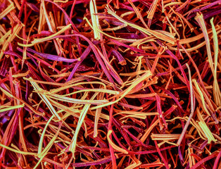 Fototapeta premium Close up saffron threads showing natural spice texture and organic luxury seasoning pattern