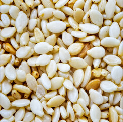 Close up sesame seeds showing natural organic food texture background