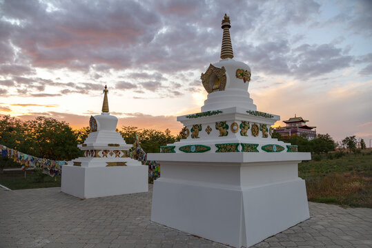 Two stupas on the territory of the Buddhist khurul of Syakyusn-Syume on sunset. Elista, Kalmykia, Russia