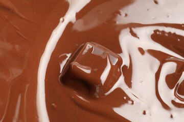 Tasty melted chocolate and piece as background, closeup
