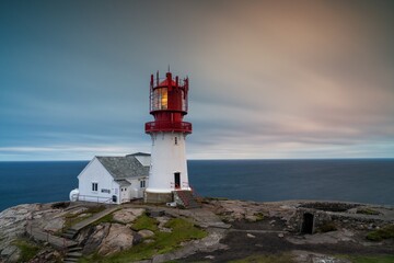 view of the Lindesnes Lighthouse in Norway at sunset