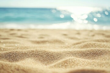 Sunlit sparkling beach sand with soft ocean blur and bright reflections, ideal for summer travel visuals, coastal branding designs, clean minimal layouts, and lifestyle background themes