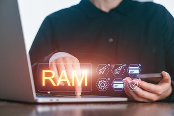 Using computer technology to monitor RAM and performance metrics while holding a phone in an office setting