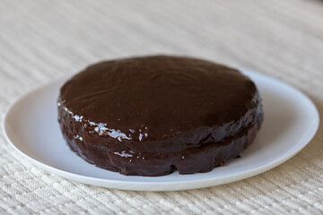 Chocolate cake Prague on the white background. Traditional Sacher cake. Ready to eat.