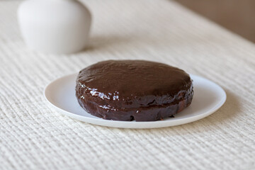 Chocolate cake Prague on the white background. Traditional Sacher cake. Ready to eat.