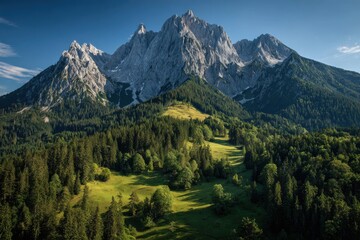 Majestic alpine mountains with sharp peaks, lush green forests, and snow-capped summits under a bright sky for serene nature landscapes and outdoor enthusiasts