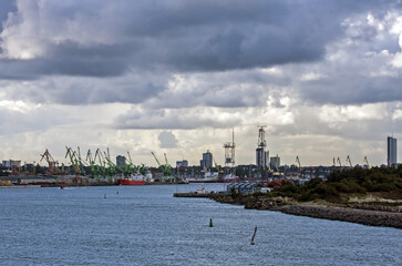 Beautiful clouds over the seaport on a summer day. The port of Klaipeda, Lithuania, is located in the northern part of the Curonian Lagoon of the Baltic Sea.