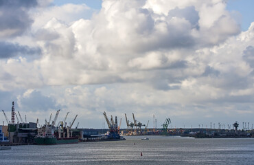 Beautiful clouds over the seaport on a summer day. The port of Klaipeda, Lithuania, is located in the northern part of the Curonian Lagoon of the Baltic Sea.
