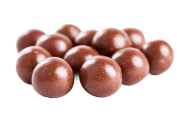 Pile of chocolate malted milk balls isolated on transparent background