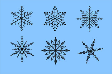 Different snowflakes in black outline on a blue background showing unique designs and shapes for winter decorations and crafts