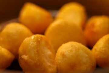 Golden roast potatoes with crispy skin for a comforting and delicious meal, a close up of a rustic side dish