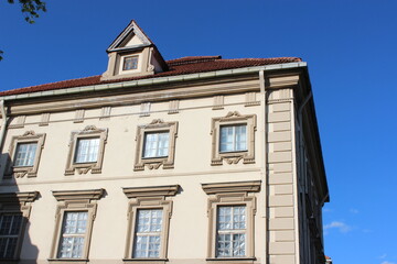 Old majestic building with stone window frames