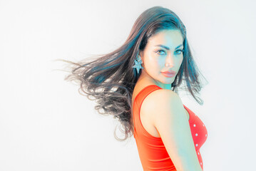 Fototapeta premium Beautiful female model posing in photo studio