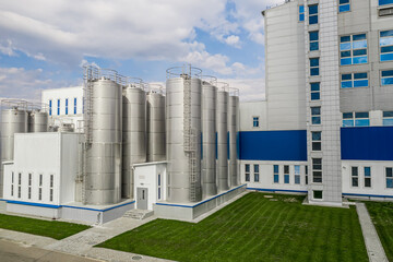 stainless steel tanks at a food processing plant side view