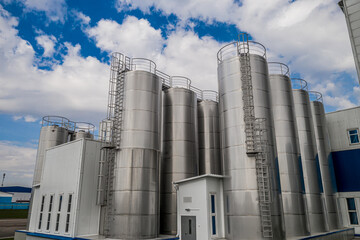 stainless steel tanks at a food processing plant top view