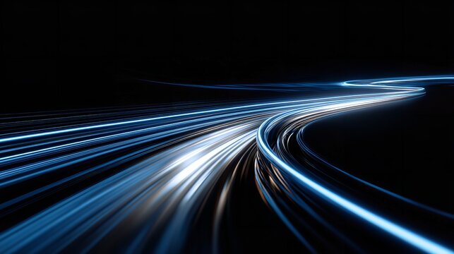Abstract colorful light trails on a highway at night capturing fast speed and motion blur from car traffic