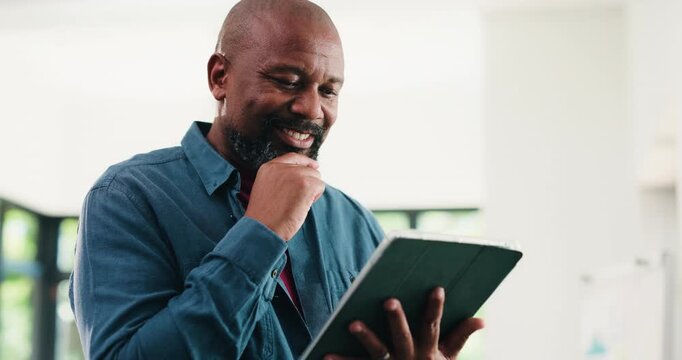 Thinking, black man and smile with tablet in office for research, proofreading and update draft. Mature person, digital and editor feedback on article, story submission and solution for publication