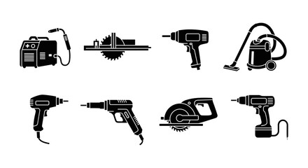 Collection of black silhouette power tools on white background