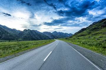 Road among scenic mountain peaks