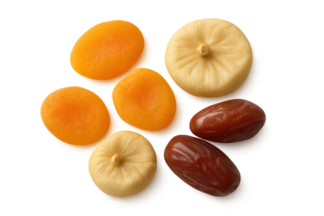 Assorted dried fruits including orange apricots and pale round figs arranged together