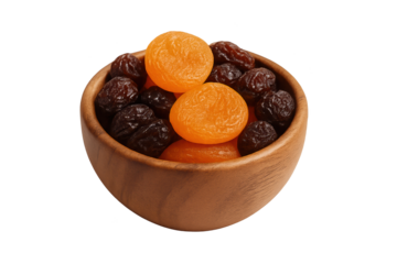 Wooden bowl filled with orange dried apricots and dark raisins