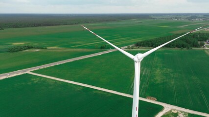 Obraz premium Green energy wind turbine in countryside