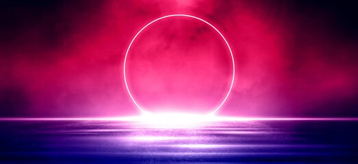  Bright reflections on the wet floor add a clean, modern, abstract look ideal for tech, sci-fi, and digital design concep	
Glowing neon circle on a dark wall creates a strong blue futuristic mood.