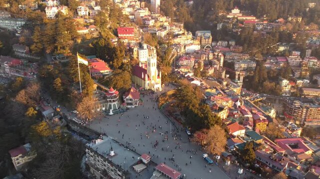 The ridge shimla drone view including mall road shimla and Christ church and people walking around the mall road shimla while video recording by drone. Hanuman mandir and Jakhu temple shimla.
