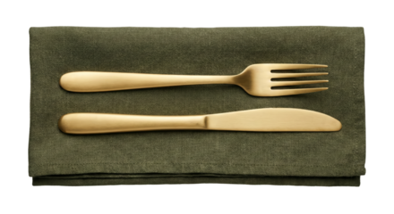 Elegant gold cutlery set artfully arranged on a textured olive green cloth isolated on a plain