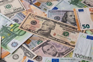 Money Background of Euros and Dollars Chaos