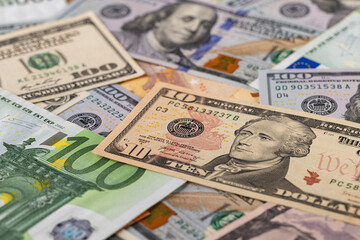 Money Background of Euros and Dollars Chaos