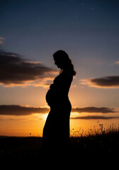 Pregnant woman in silhouette