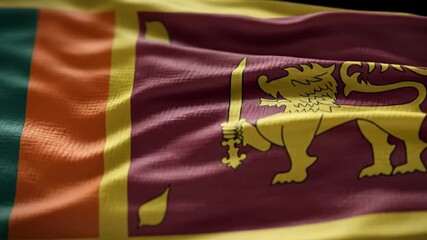 Sri Lanka national flag gently waving under natural light, showing vibrant colors and textile folds for cultural or independence visuals.
