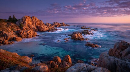 Rocky coastline at sunset with waves washing on a secluded shore