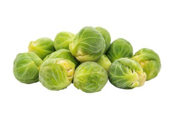 A pile of fresh green Brussels sprouts with visible layers of leaves and pale yellow centers isolated on a transparent background